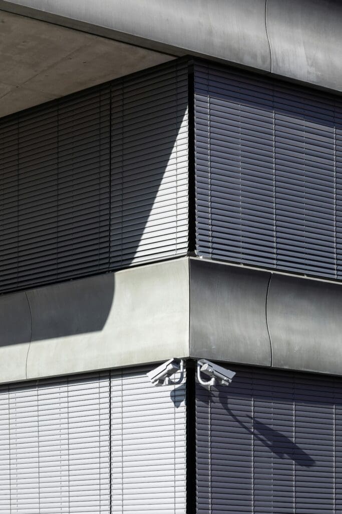 a cctv on the wall of a building